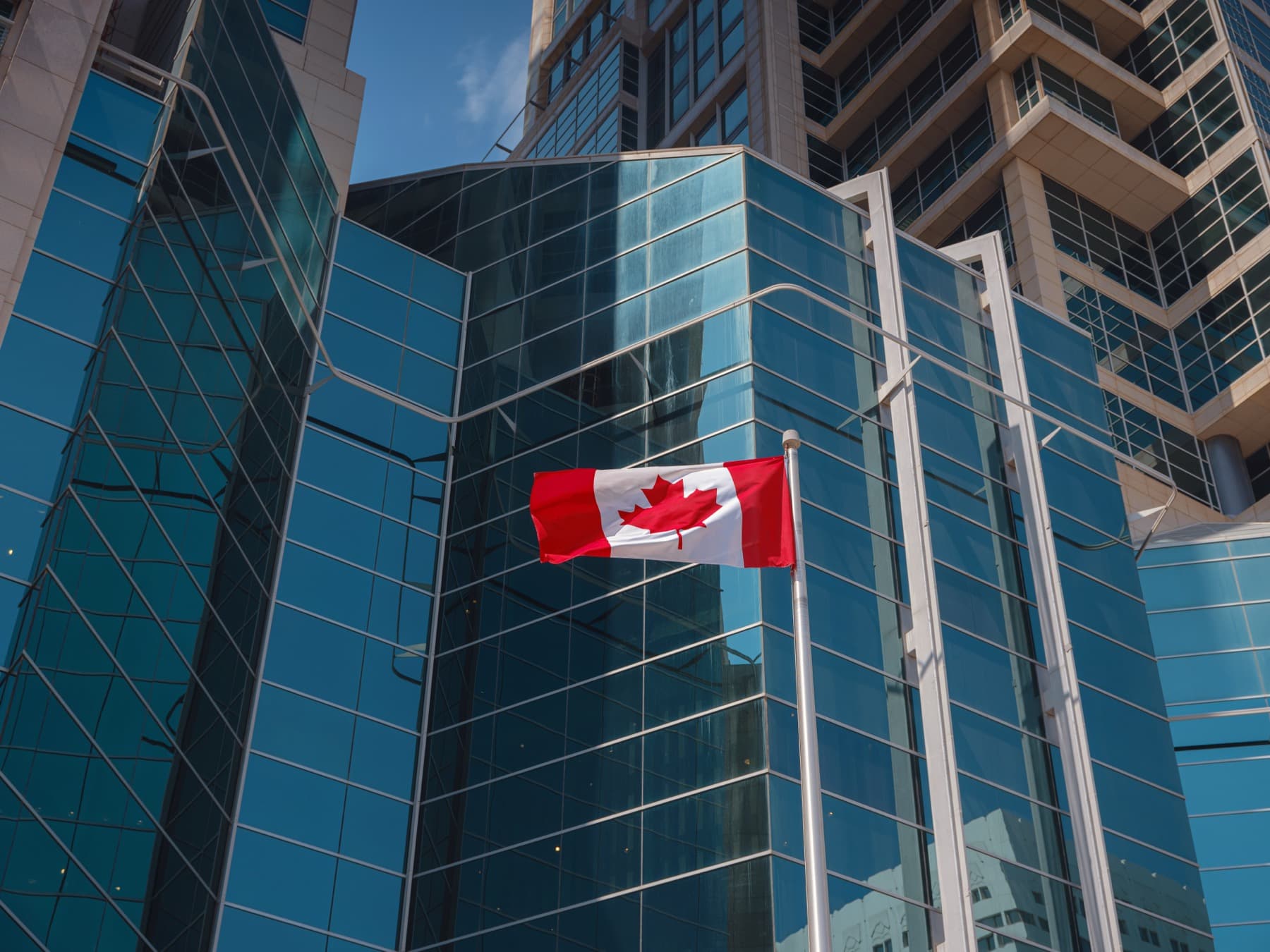 Canadian flag representing a transfer within Canada